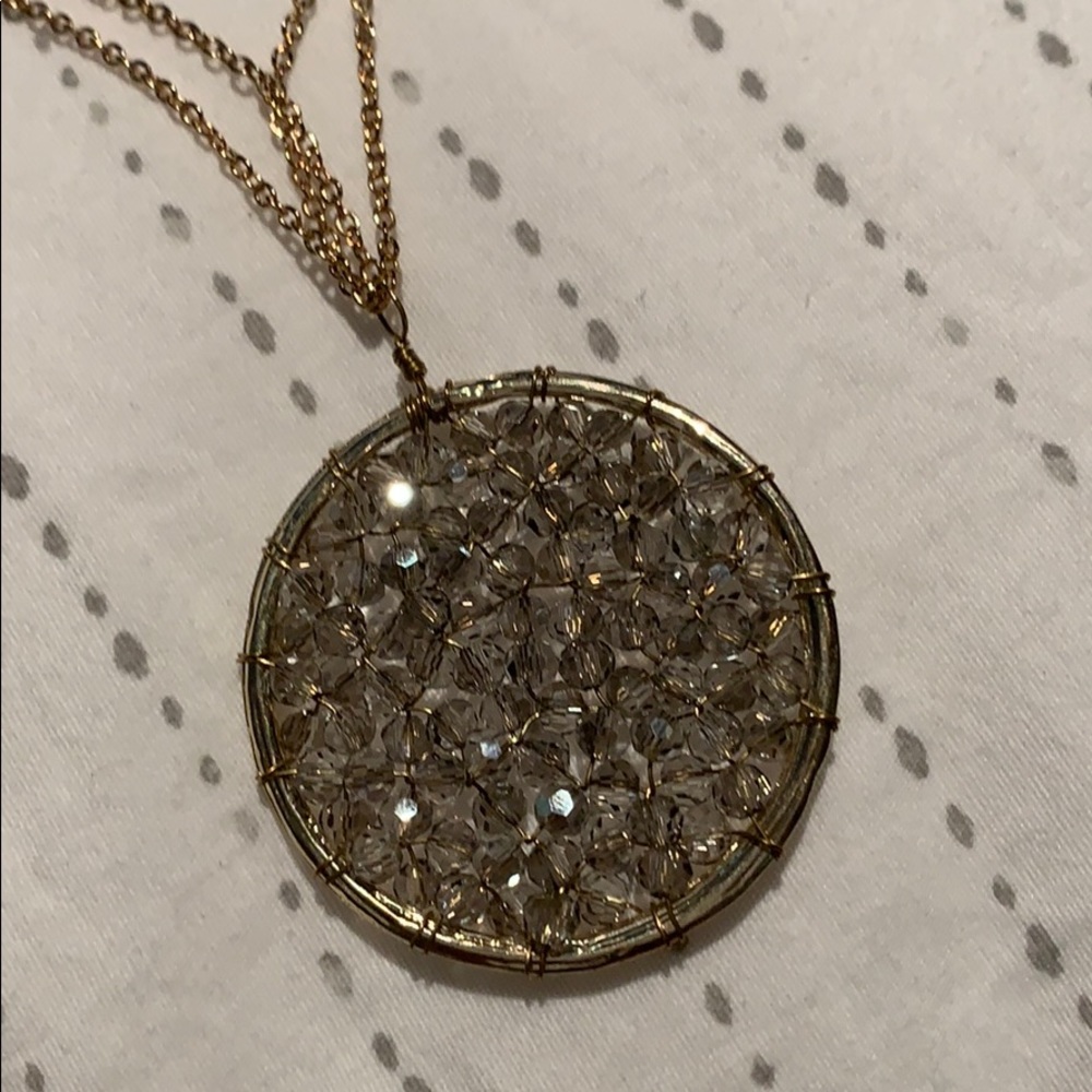 Decorative necklace with beaded pendant